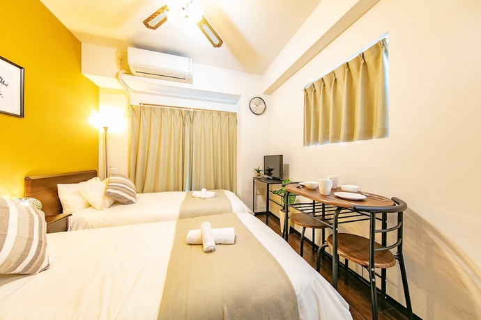 Imagen de la habitación del Hotel The First Shin-Osaka. Foto 17
