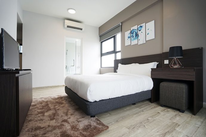 Imagen de la habitación del Hotel The First Stay. Foto 8