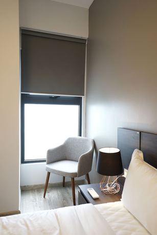 Imagen de la habitación del Hotel The First Stay. Foto 10