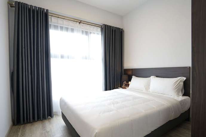 Imagen de la habitación del Hotel The First Stay. Foto 16