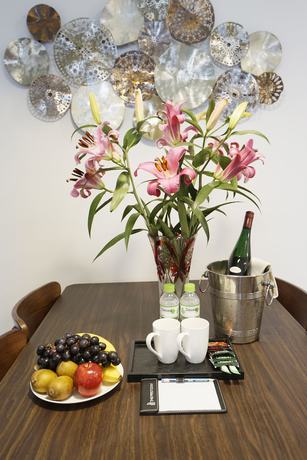 Imagen de la habitación del Hotel The First Stay. Foto 18