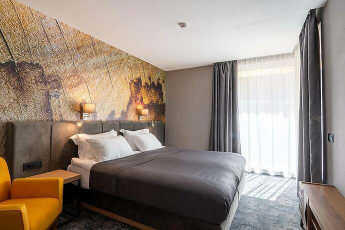 Imagen de la habitación del Hotel The Five Elements Hotel. Foto 20