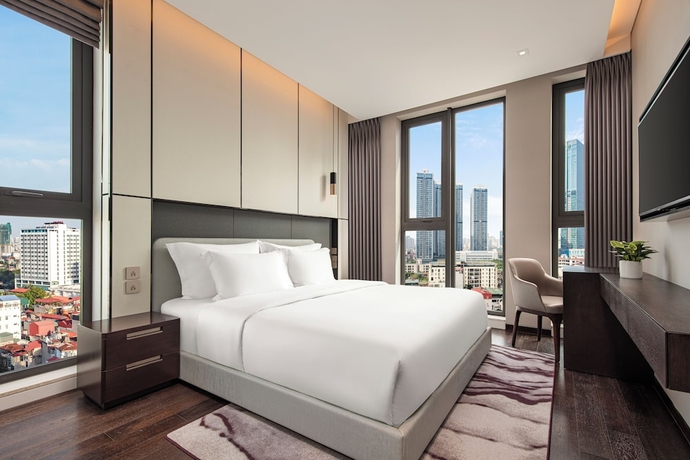Imagen de la habitación del Hotel The Five Residences Hanoi. Foto 5