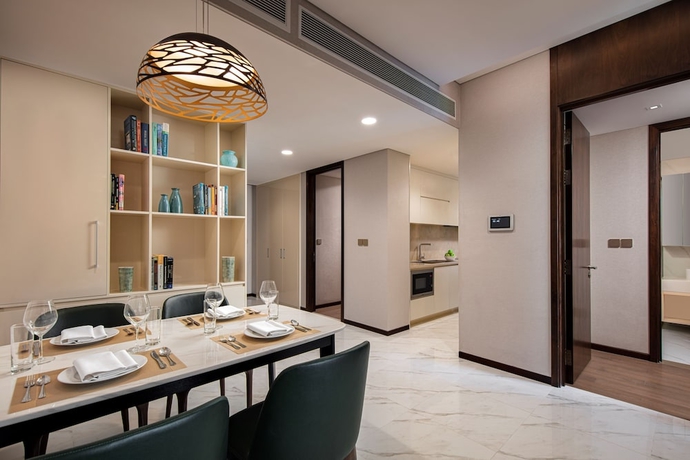 Imagen de la habitación del Hotel The Five Residences Hanoi. Foto 10