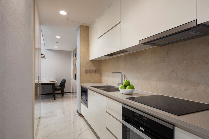 Imagen de la habitación del Hotel The Five Residences Hanoi. Foto 11