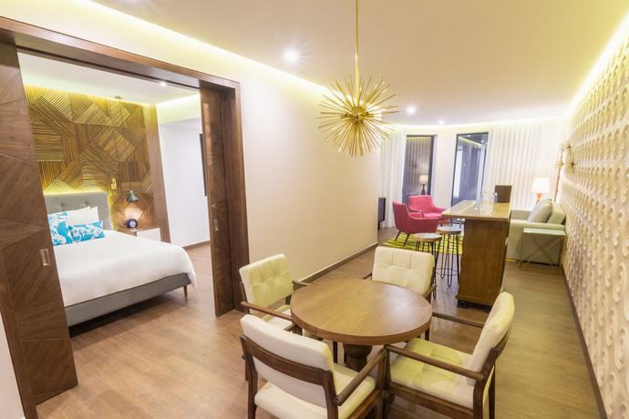 Imagen de la habitación del Hotel The Fives Downtown Hotel and Residences, Curio Collection by Hilton. Foto 6