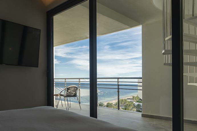 Imagen de la habitación del Hotel The Fives Oceanfront - Puerto Morelos. Foto 3