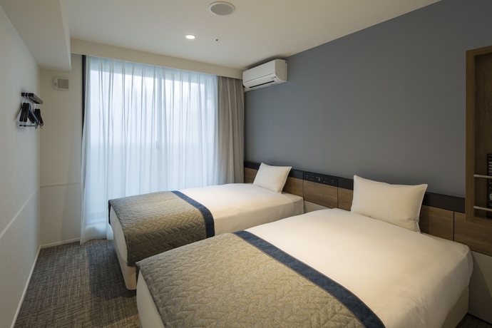 Imagen de la habitación del Hotel The Flag Shinsaibashi. Foto 4