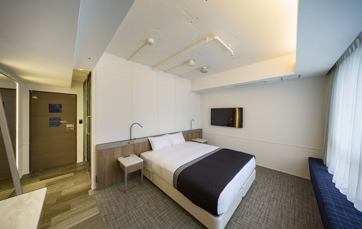 Imagen de la habitación del Hotel The Flag Shinsaibashi. Foto 11