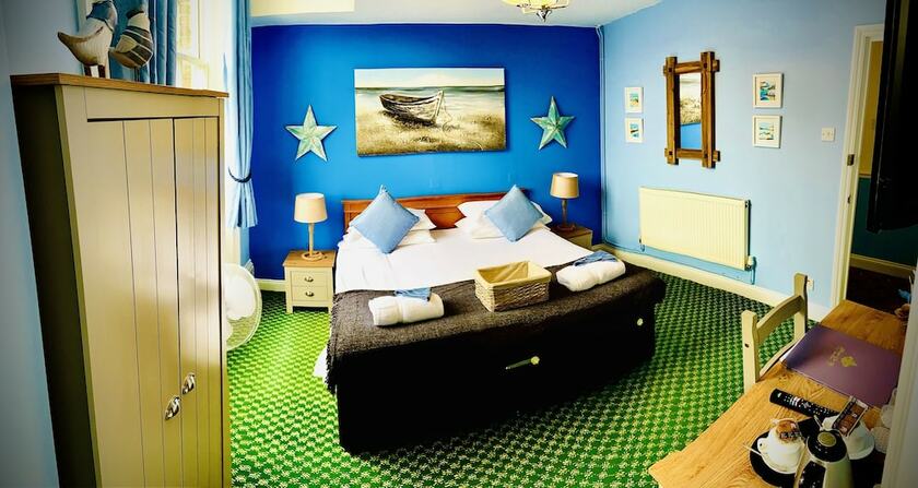 Imagen de la habitación del Hotel The Fleur De Lis. Foto 11