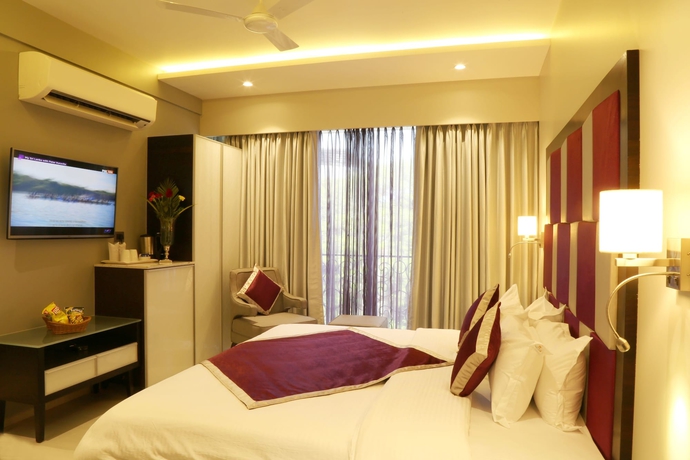 Imagen de la habitación del Hotel The Flora Grand. Foto 9