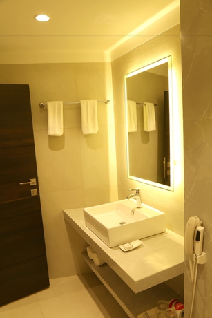 Imagen de la habitación del Hotel The Flora Grand. Foto 10