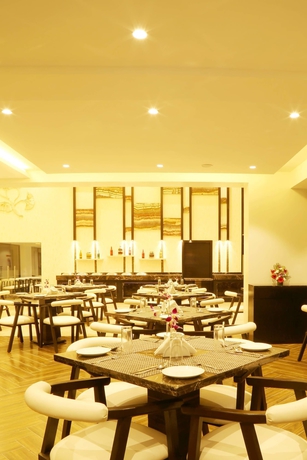 Imagen del bar/restaurante del Hotel The Flora Grand. Foto 8