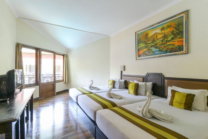 Imagen de la habitación del Hotel The Flora Kuta Bali. Foto 9