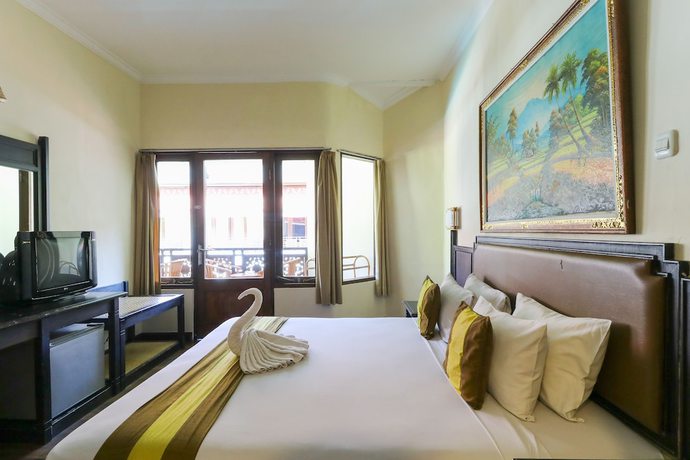 Imagen de la habitación del Hotel The Flora Kuta Bali. Foto 10