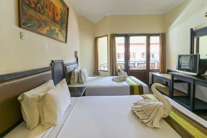 Imagen de la habitación del Hotel The Flora Kuta Bali. Foto 11