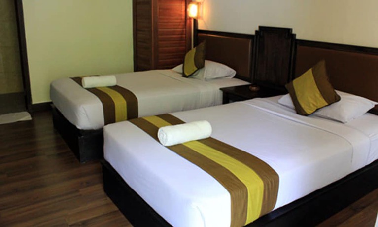 Imagen de la habitación del Hotel The Flora Kuta Bali. Foto 12