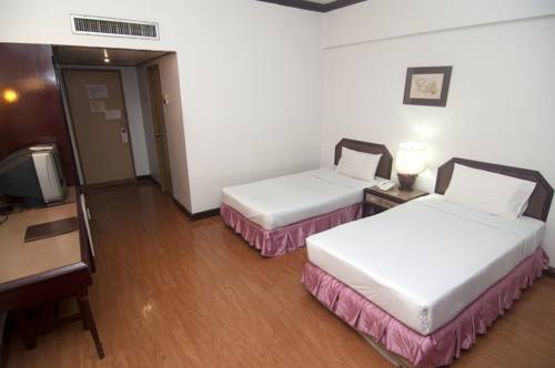 Imagen de la habitación del Hotel The Florida Hatyai. Foto 4