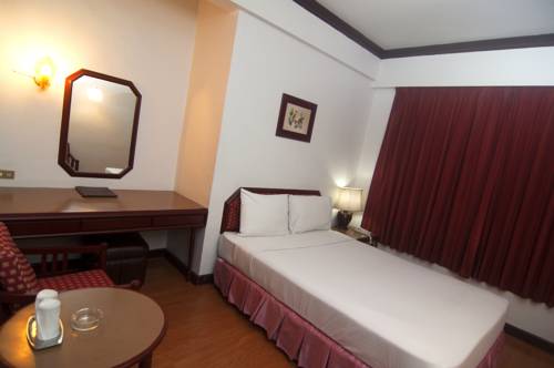 Imagen de la habitación del Hotel The Florida Hatyai. Foto 5