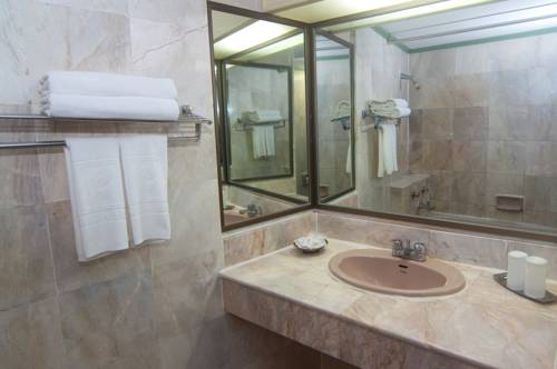 Imagen de la habitación del Hotel The Florida Hatyai. Foto 6