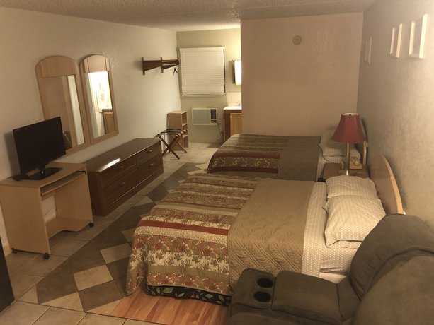 Imagen de la habitación del Hotel The Floridian Inn. Foto 5