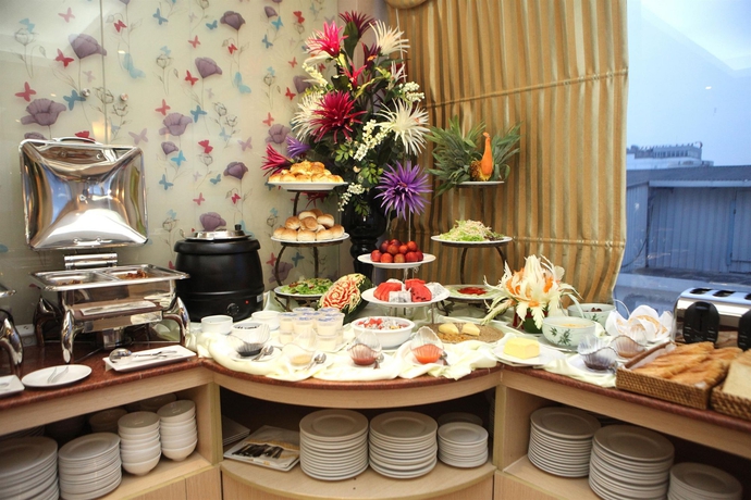 Imagen del bar/restaurante del Hotel The Flower Boutique and Travel. Foto 2