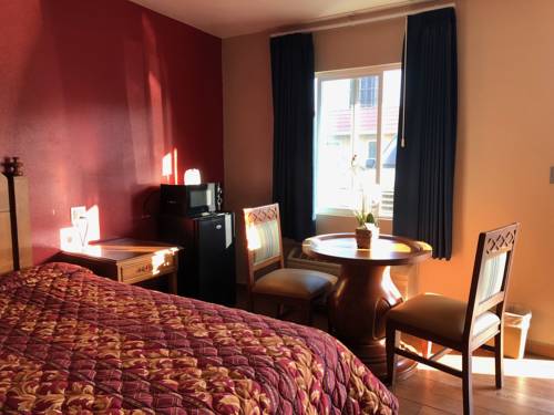 Imagen de la habitación del Hotel The Fly Inn. Foto 4