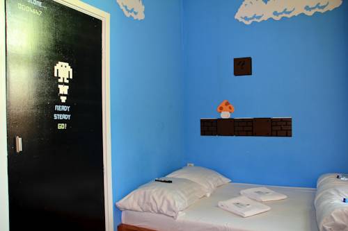 Imagen de la habitación del Hotel The Flying Pig Uptown. Foto 16