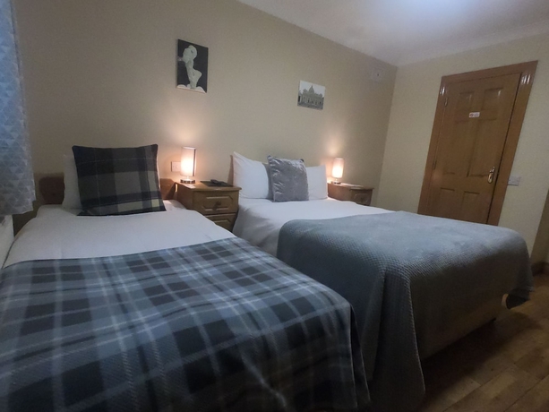 Imagen de la habitación del Hotel The Foggy Dew Inn. Foto 12