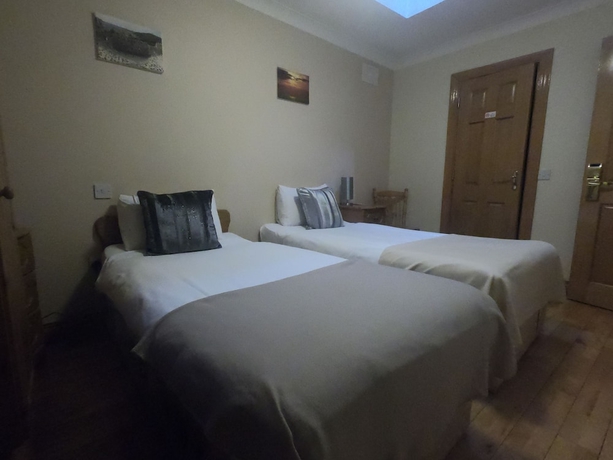 Imagen de la habitación del Hotel The Foggy Dew Inn. Foto 13
