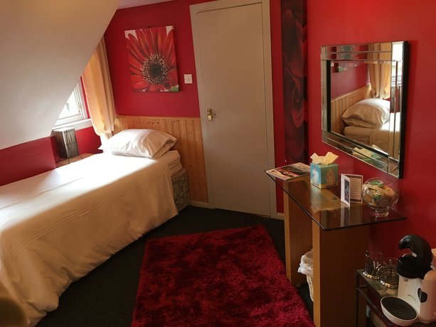 Imagen de la habitación del Hotel The Folly. Foto 12