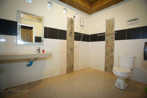Imagen de la habitación del Hotel The Ford Sunset Beach Resort. Foto 5