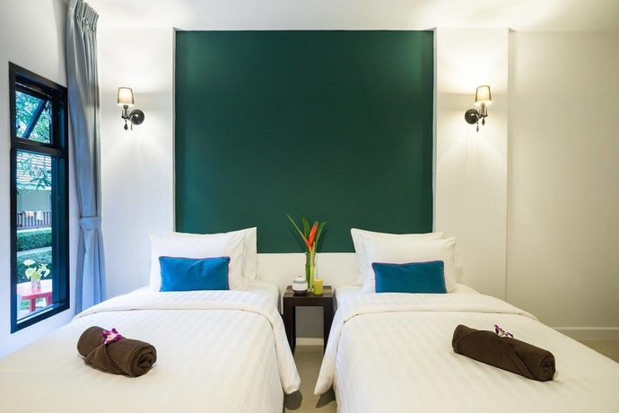 Imagen de la habitación del Hotel The Forest Home Resort. Foto 3