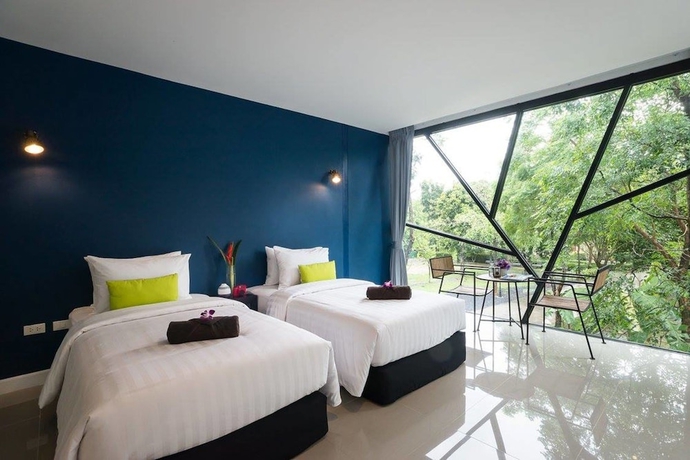 Imagen de la habitación del Hotel The Forest Home Resort. Foto 11