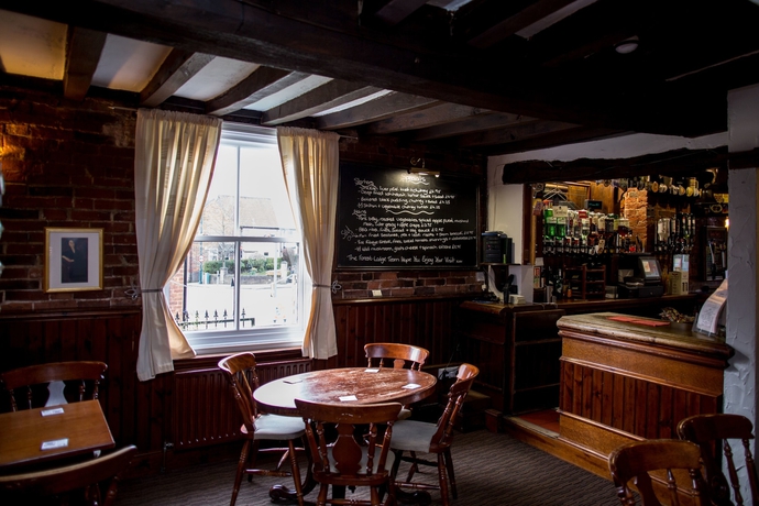 Imagen del bar/restaurante del Hotel The Forest Lodge. Foto 6