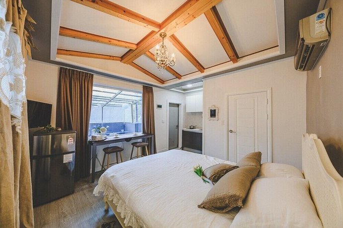 Imagen de la habitación del Hotel The Foret Pension. Foto 13