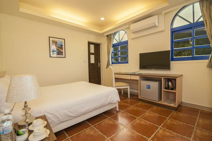 Imagen de la habitación del Hotel The Forget Worry Villa. Foto 17