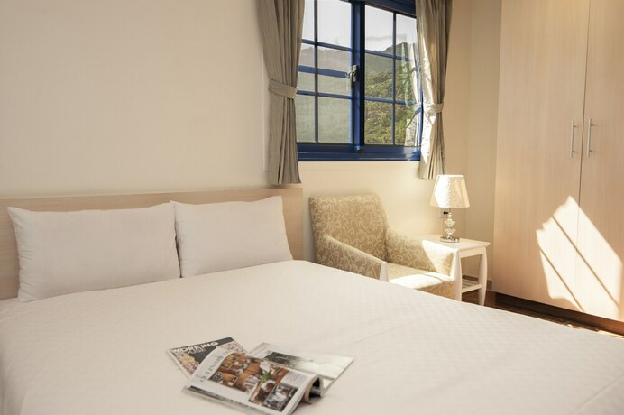 Imagen de la habitación del Hotel The Forget Worry Villa. Foto 20
