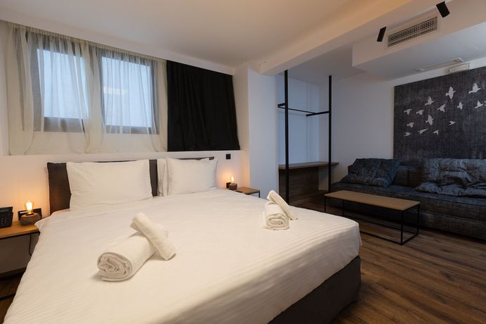 Imagen de la habitación del Hotel The Fountain Athens. Foto 3