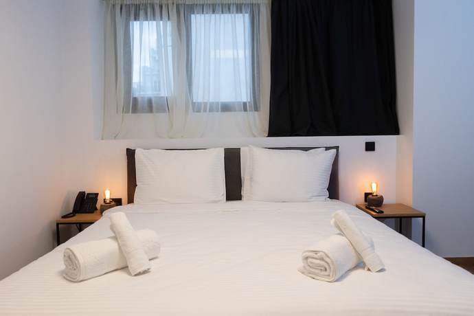 Imagen de la habitación del Hotel The Fountain Athens. Foto 4