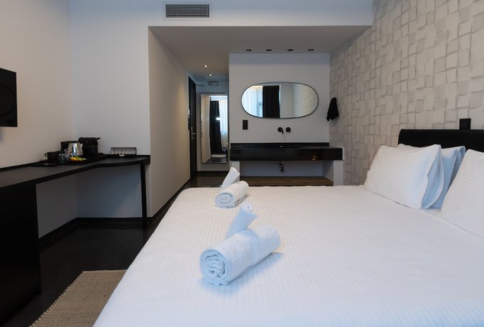 Imagen de la habitación del Hotel The Fountain Athens. Foto 9