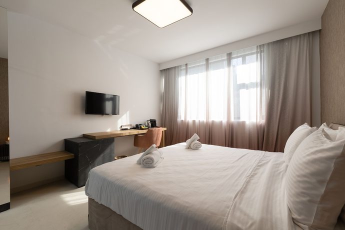 Imagen de la habitación del Hotel The Fountain Athens. Foto 10