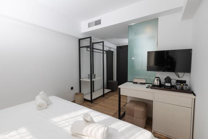 Imagen de la habitación del Hotel The Fountain Athens. Foto 16