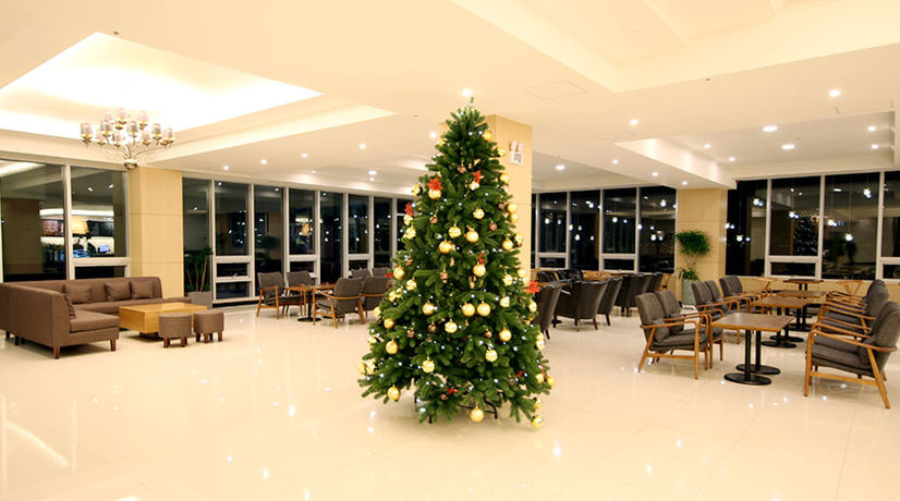Imagen del bar/restaurante del Hotel The Four Graces Resort. Foto 11