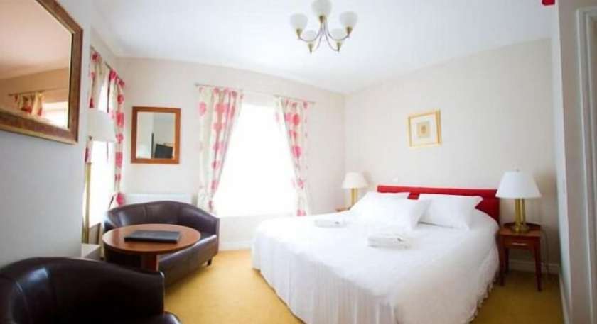 Imagen de la habitación del Hotel The Four Seasons. Foto 6