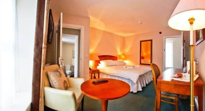 Imagen de la habitación del Hotel The Four Seasons. Foto 10