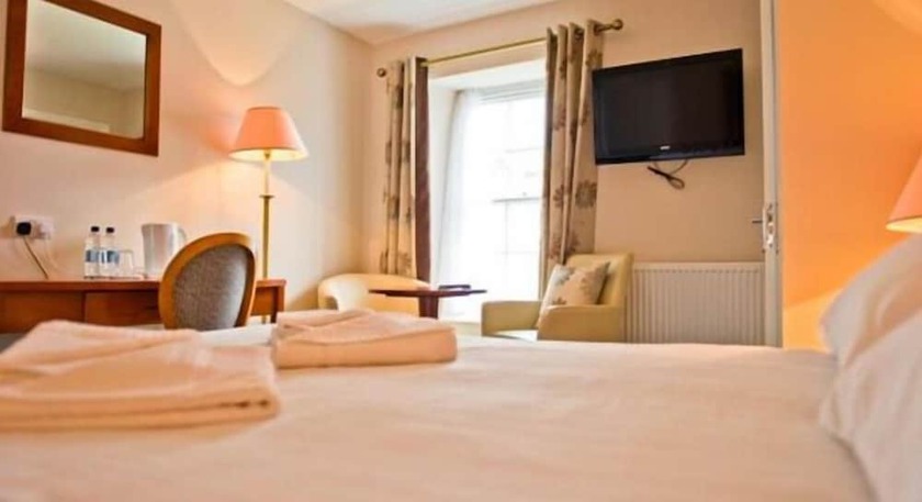 Imagen de la habitación del Hotel The Four Seasons. Foto 13