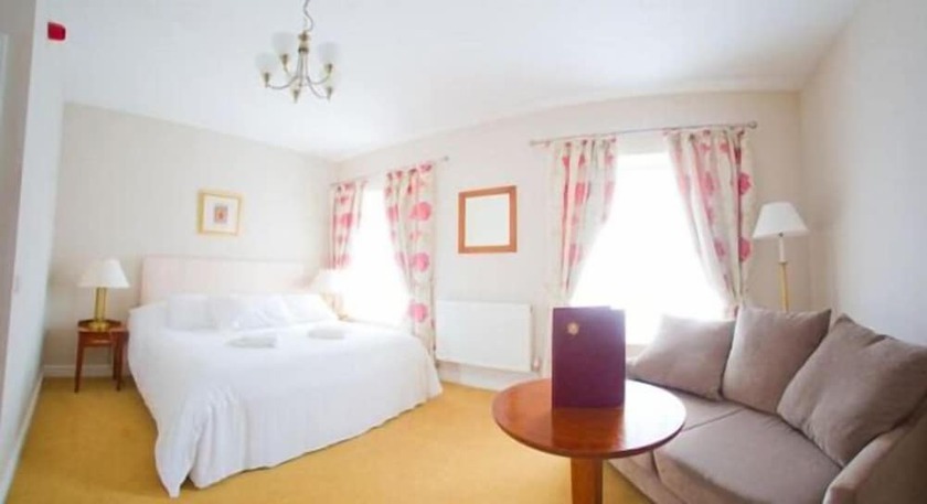 Imagen de la habitación del Hotel The Four Seasons. Foto 15