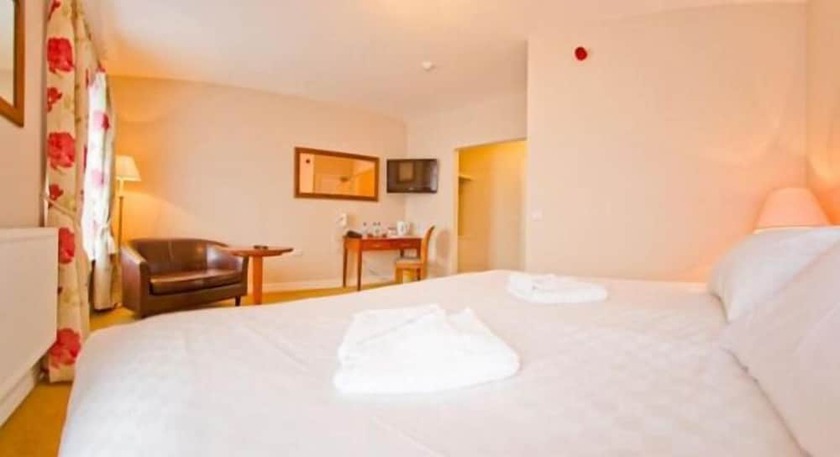 Imagen de la habitación del Hotel The Four Seasons. Foto 19