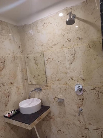 Imagen de la habitación del Hotel The Fragrance. Foto 11
